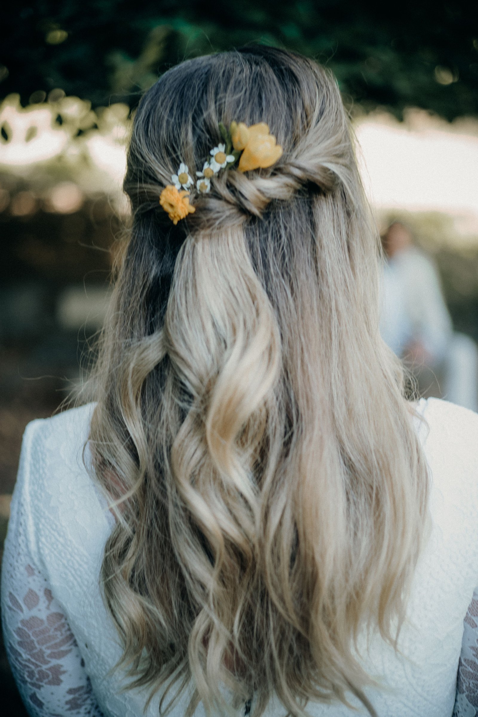 A close-up of a fishtail braid, one of the most romantic braided wedding hairstyles.