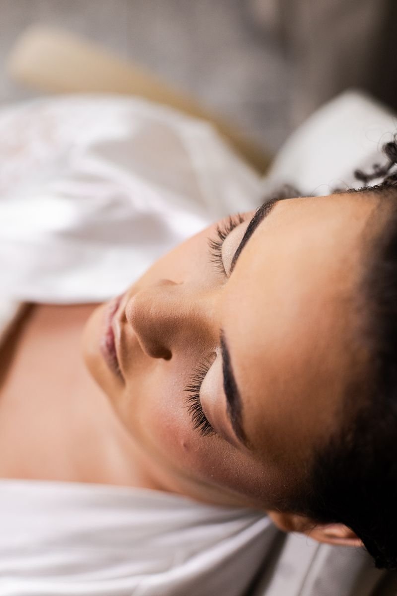 A close up of a bride with natural, warm toned wedding makeup for olive skin.