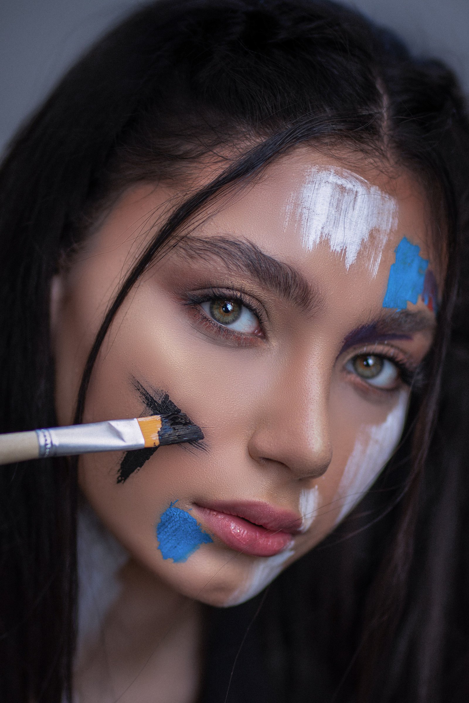 Professional face paint used for a creative photoshoot look
