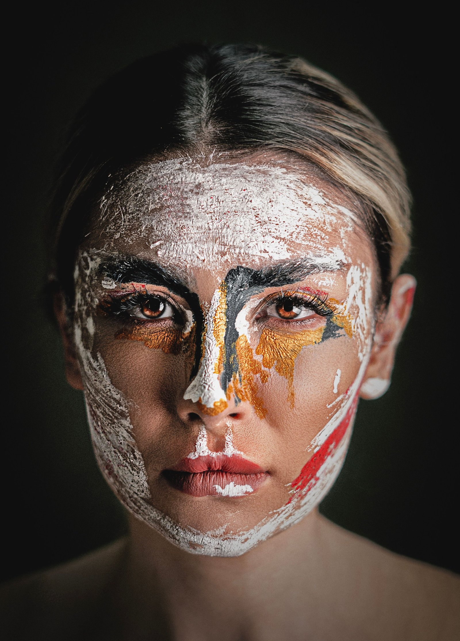 Artistic color makeup application using professional face paint