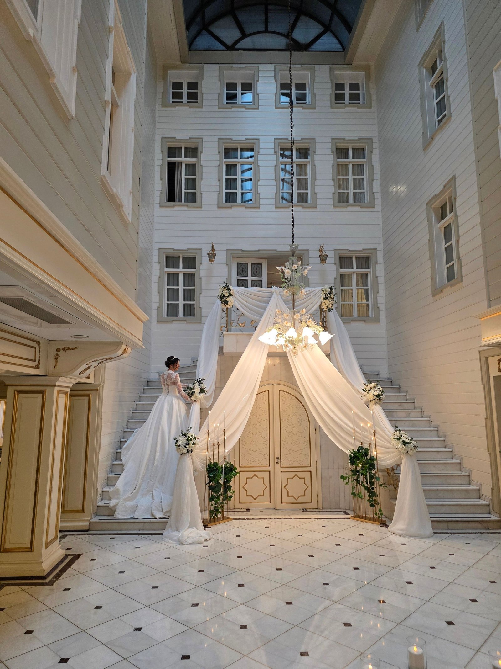 An indoor wedding ceremony setup with warm lighting, illustrating Oxford Exchange wedding cost planning.