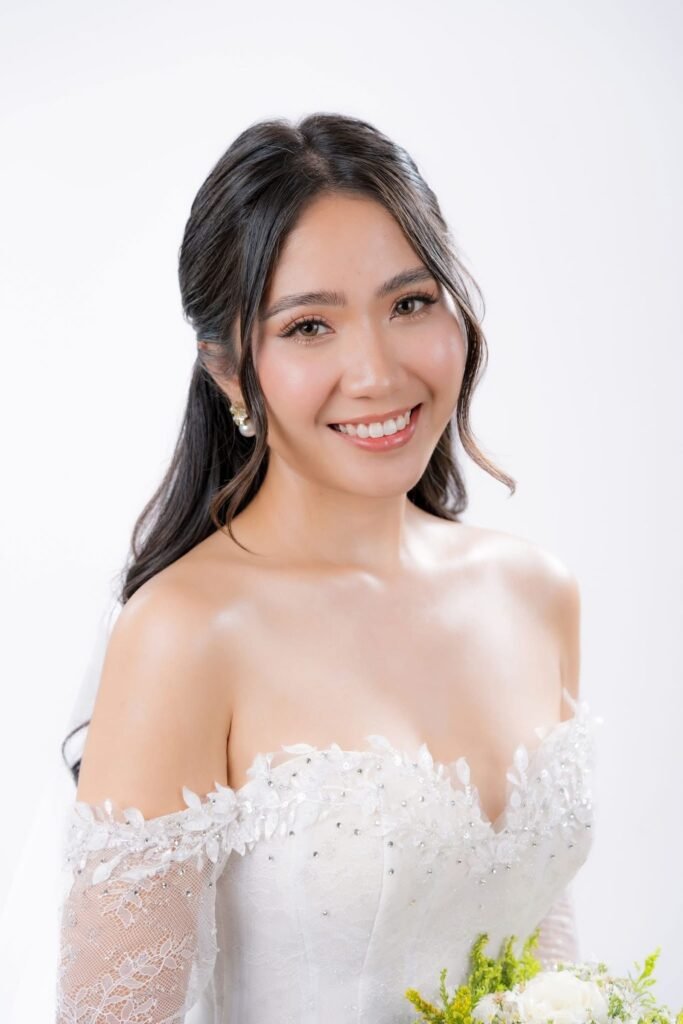 Bride smiling with a soft nude pink lip created with Pillow Talk lip liner