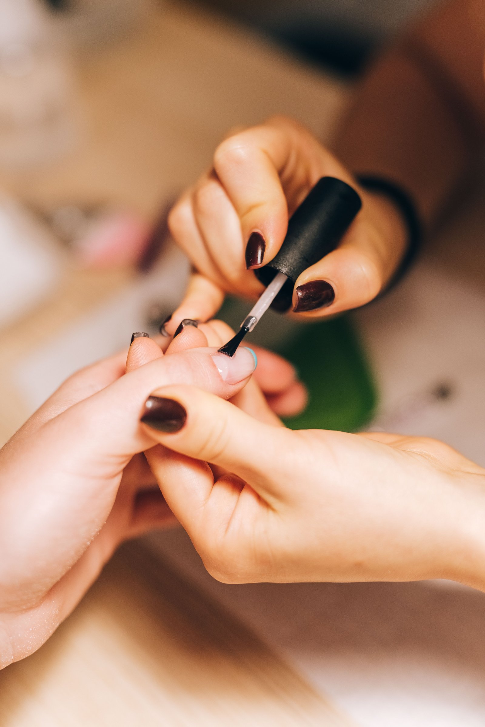 Kiss Vitabond nail glue applied to a press-on nail