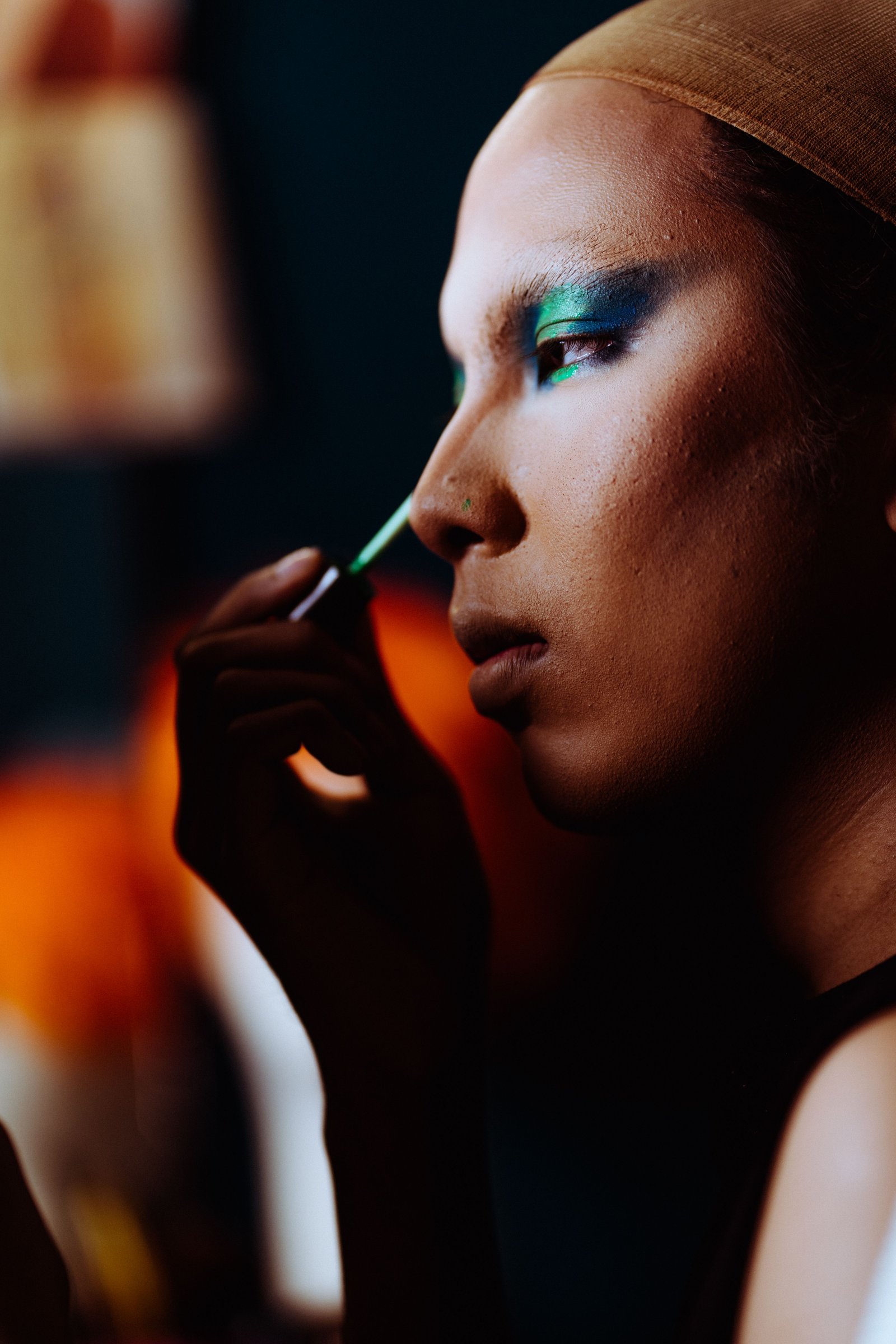Heavy coverage editorial makeup using a pancake foundation base