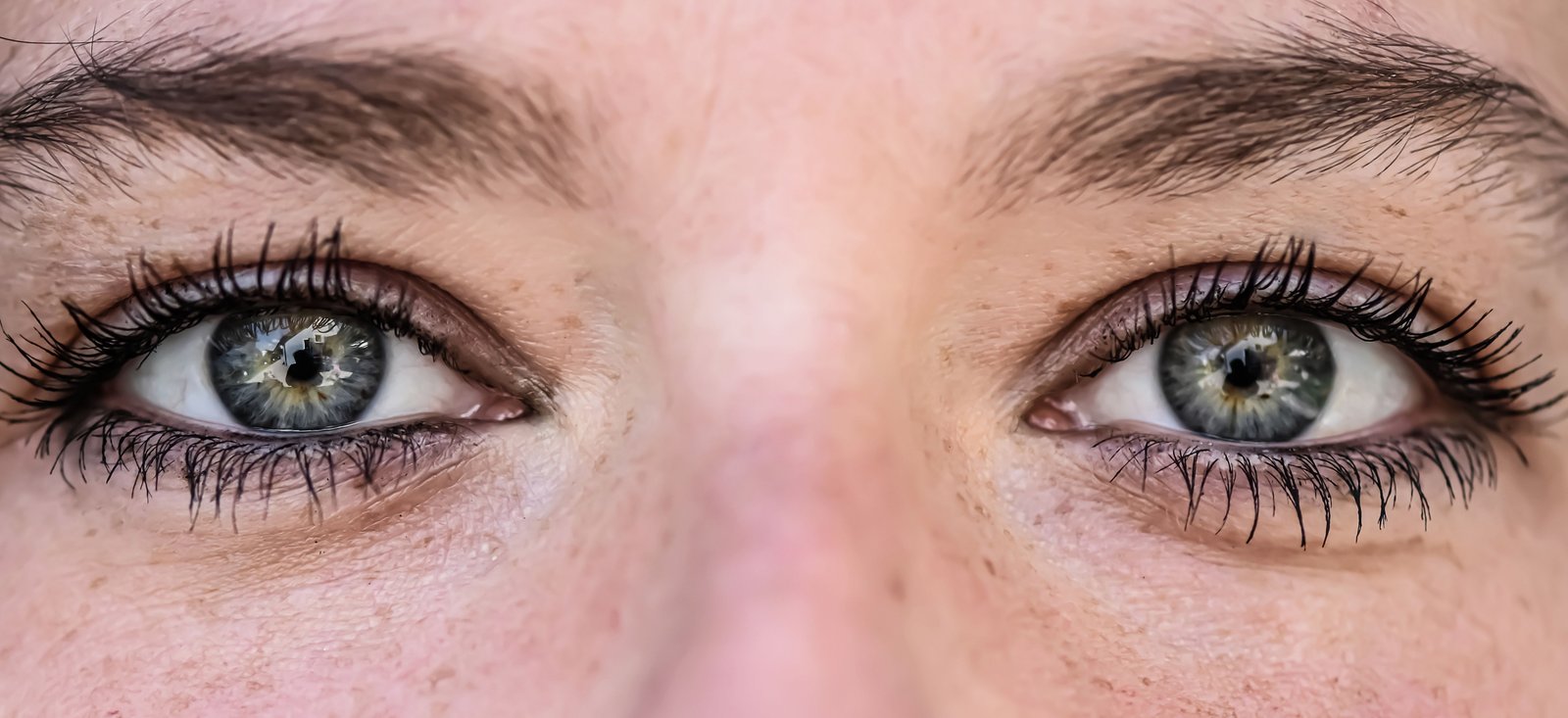 Detailed close-up of eyes with lashes and eyebrows