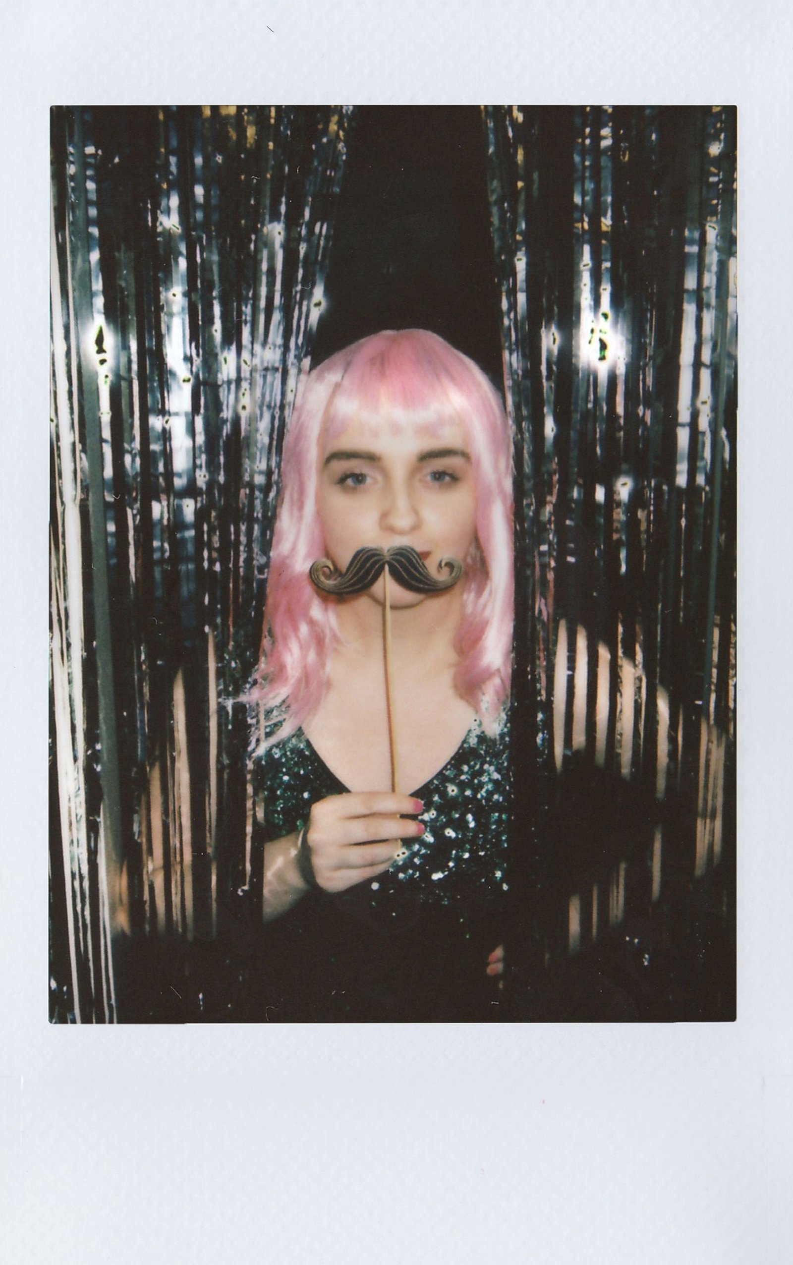 Fake mustaches and other wedding photo booth props