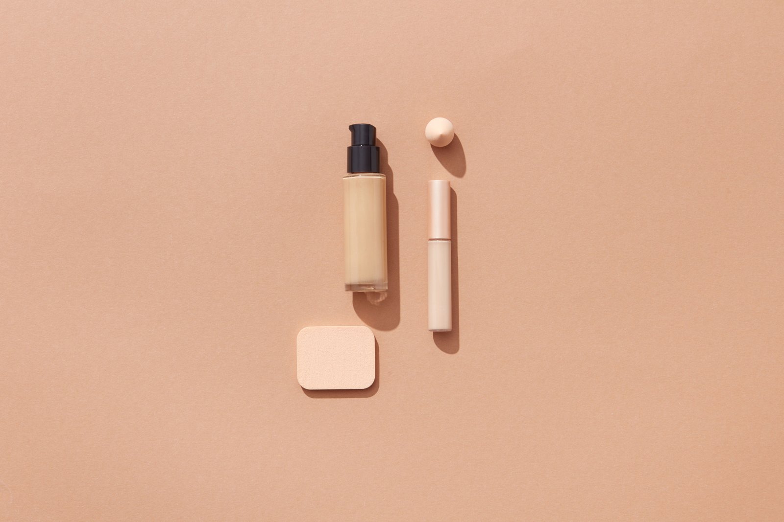 Flat lay of foundation and beauty products