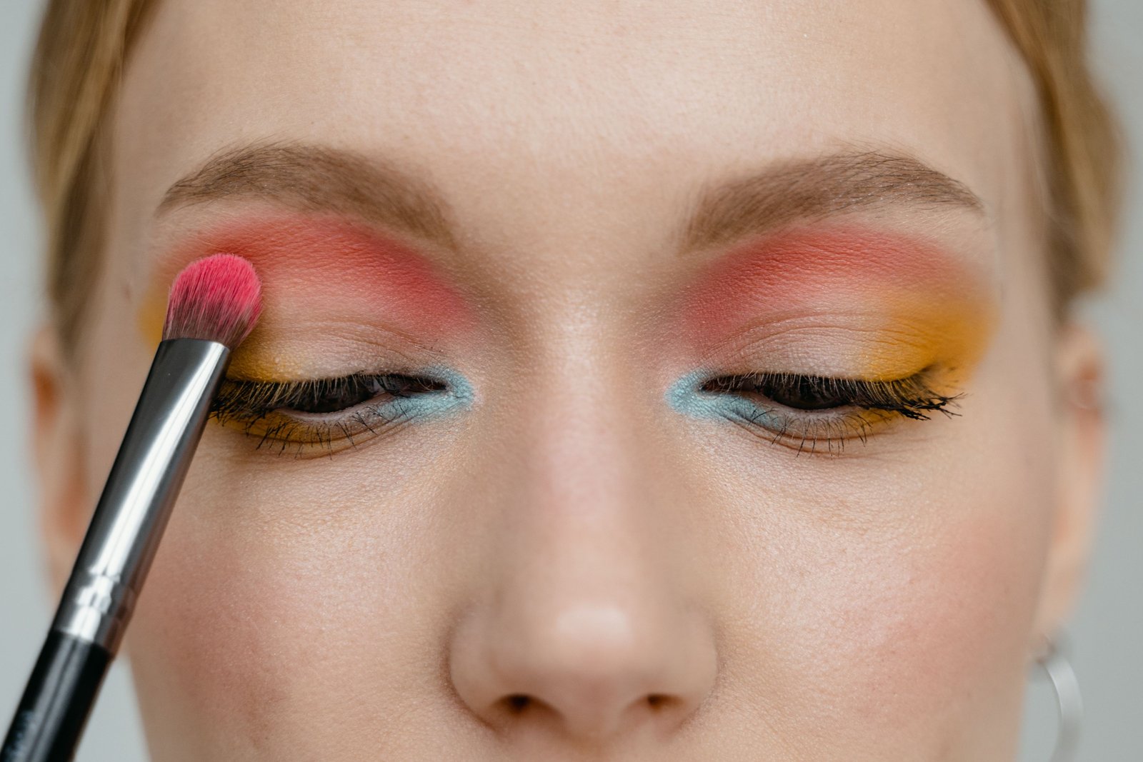Close-up eye makeup application chosen to complement eye color