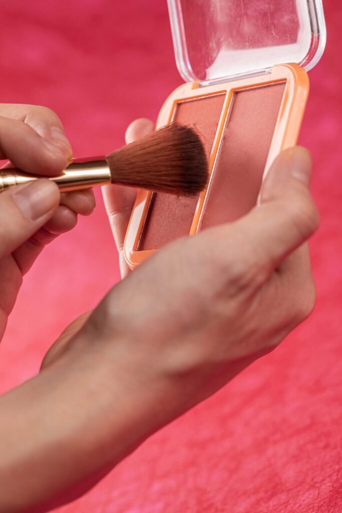 Soft pink powder blush compact and brush, similar in style to the Charlotte Tilbury heart blush